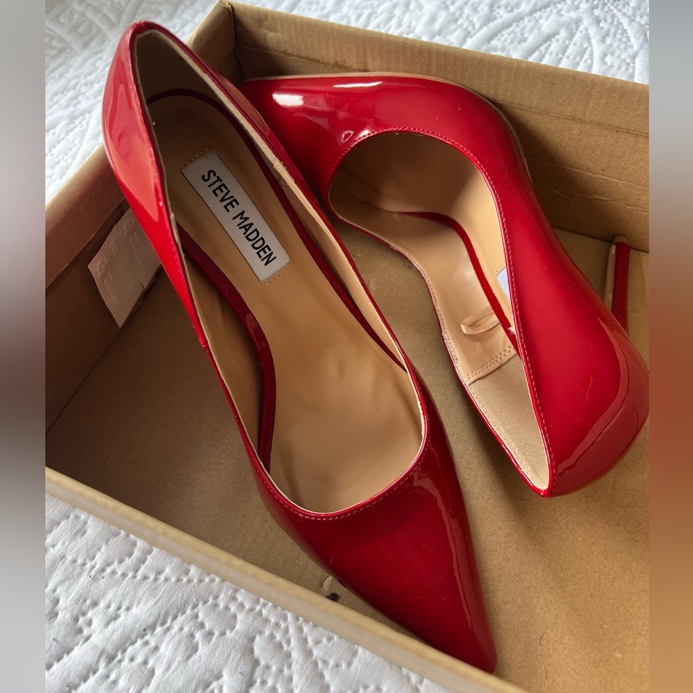 Deep red Steve Madden pointed toe pumps in size 7